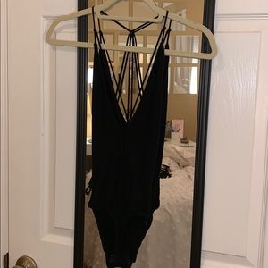 Urban Outfitters Tops - Low front strap bodysuit Urban Outfitters Tops - Low front strap bodysuit